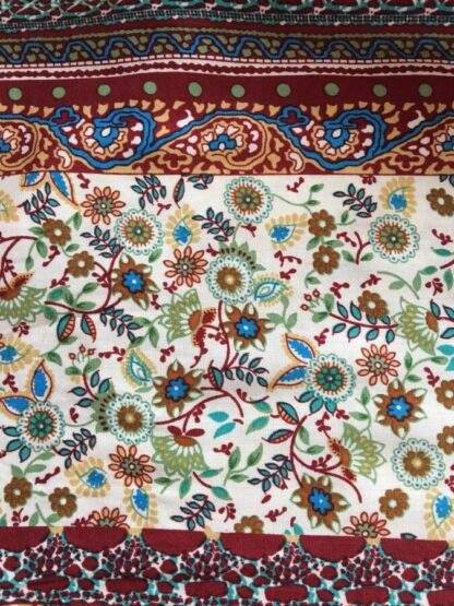 A close up of the fabric with flowers on it