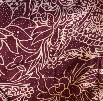 A close up of the fabric with flowers
