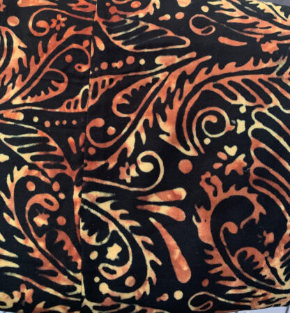 A close up of the pattern on a pillow